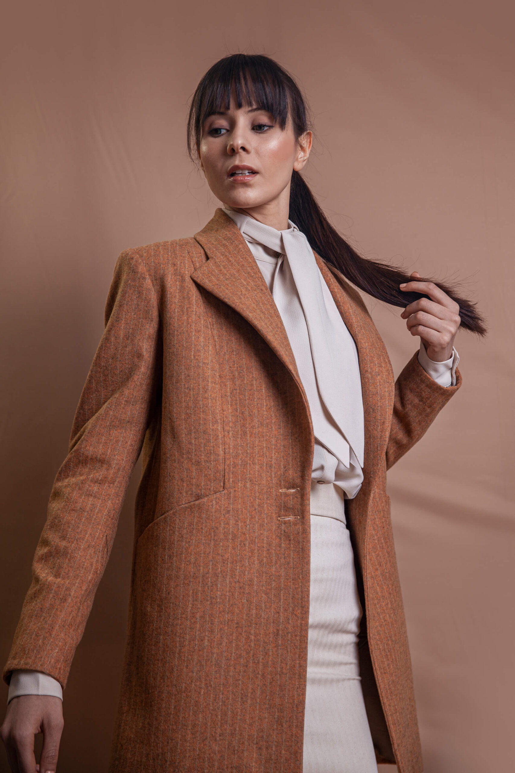 Women wearing Camel coat