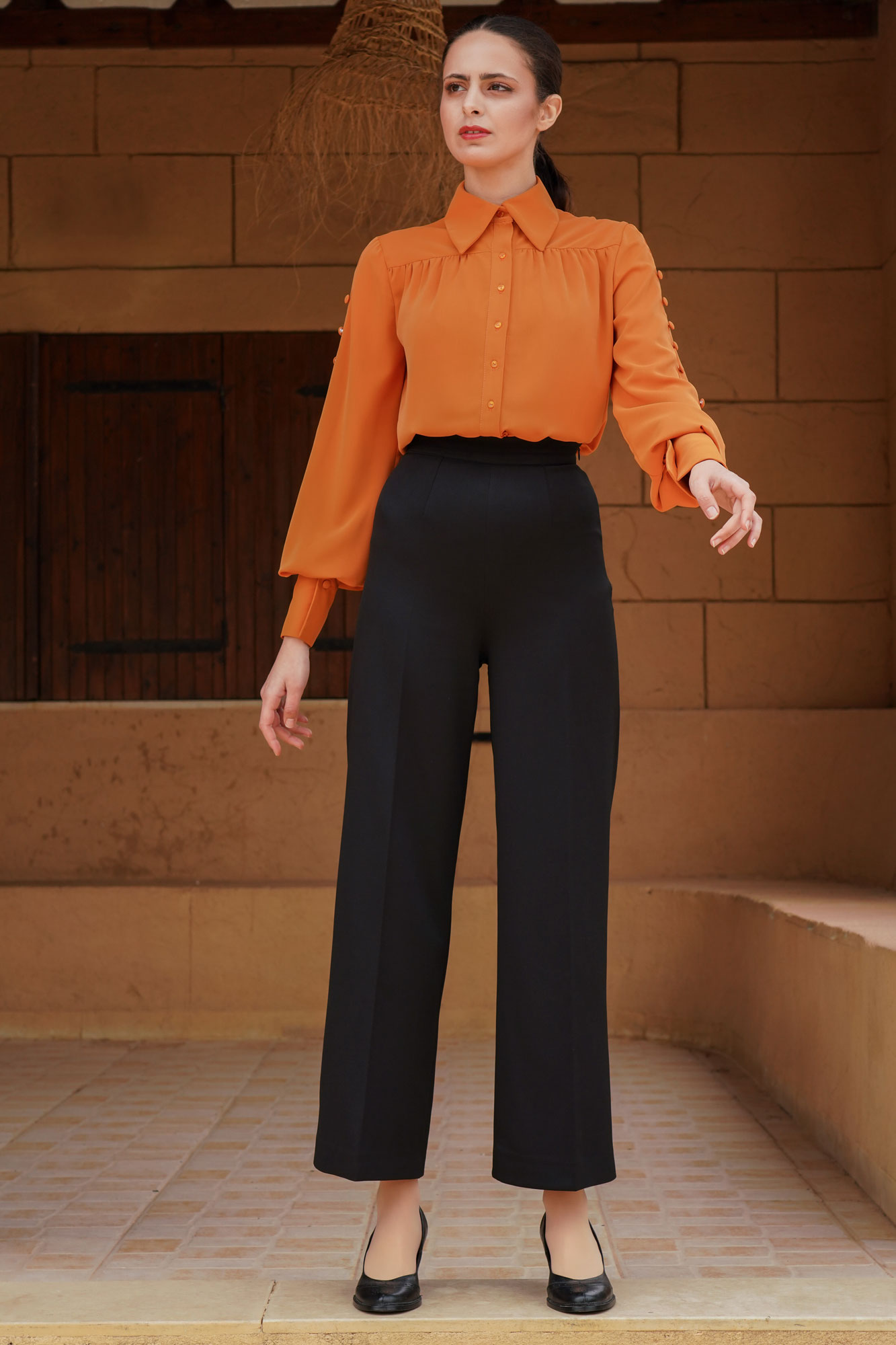 Two Pieces Orange Shirt With Buttons And Black Pants