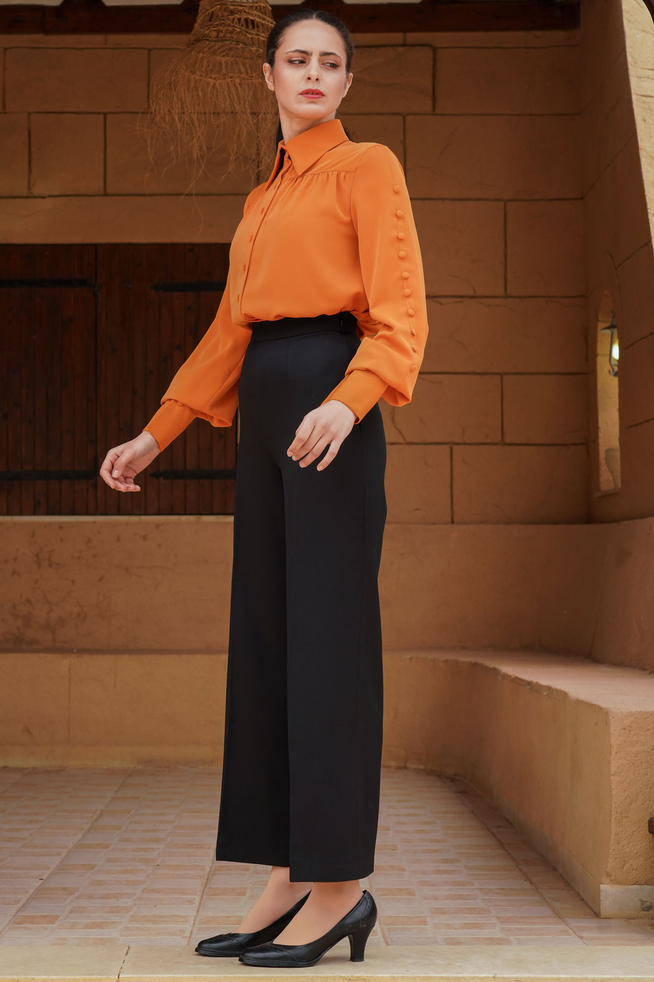 Two Pieces Orange Shirt With Buttons And Black Pants